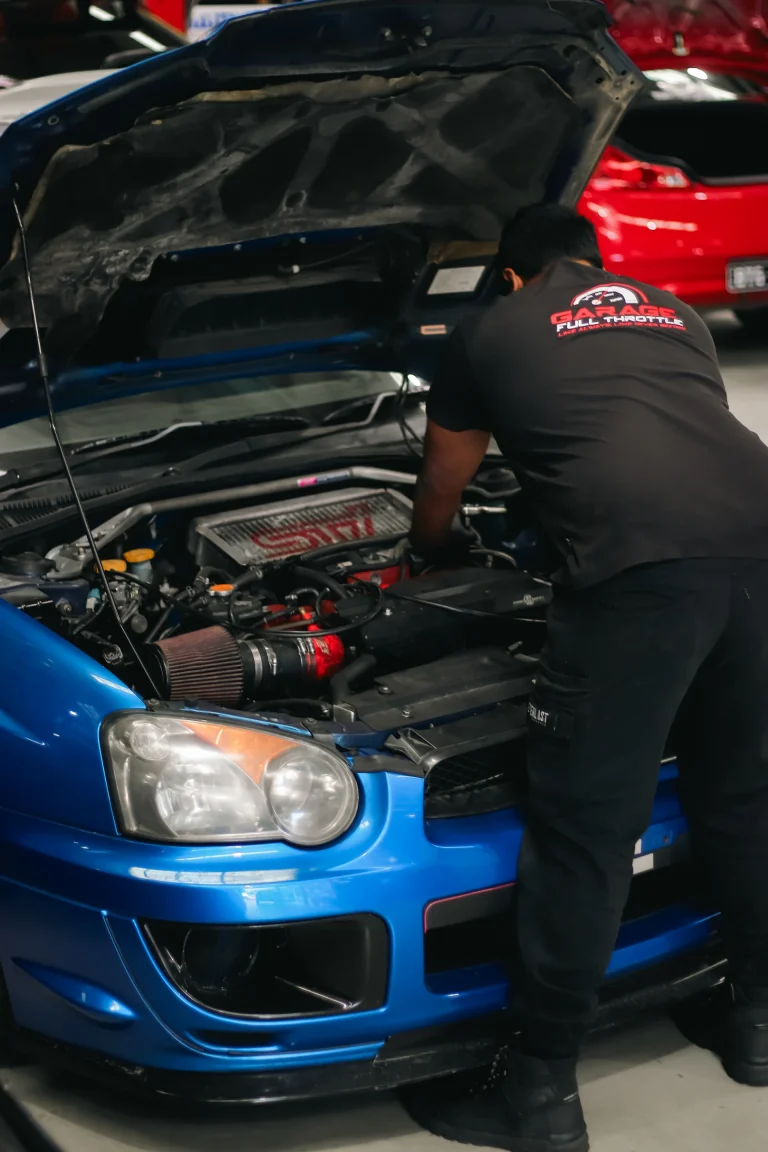 Garage Full Throttle Mechanic Installing Performance Parts
