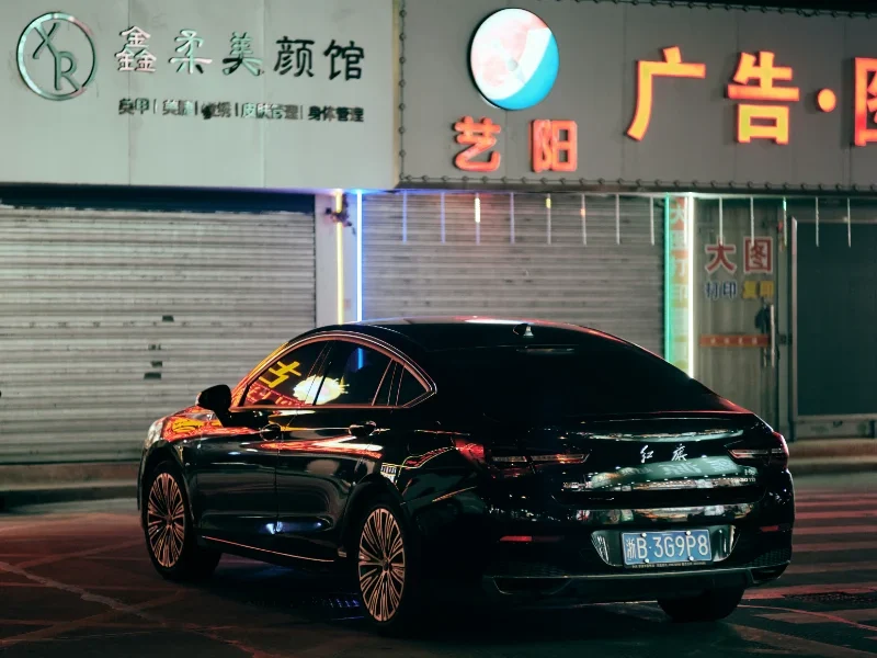 Made in China vehicle with Chinese car brand dealership signage showing automotive industry growth
