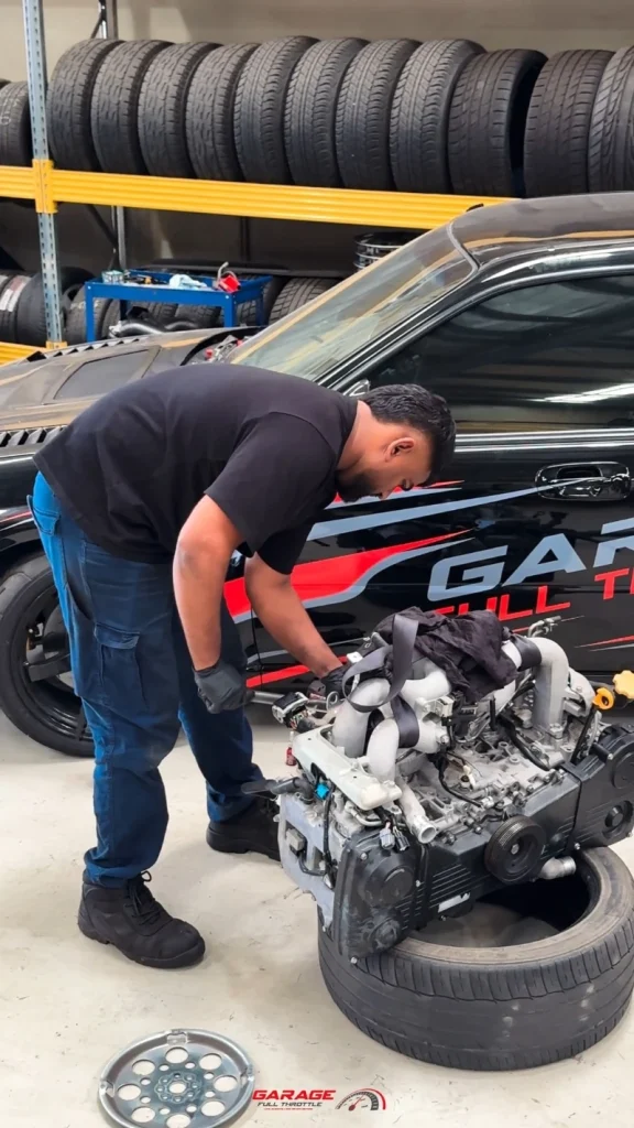 Mechanic inspecting engine components at Garage Full Throttle revealing hidden roadworthy inspection issues in Craigieburn