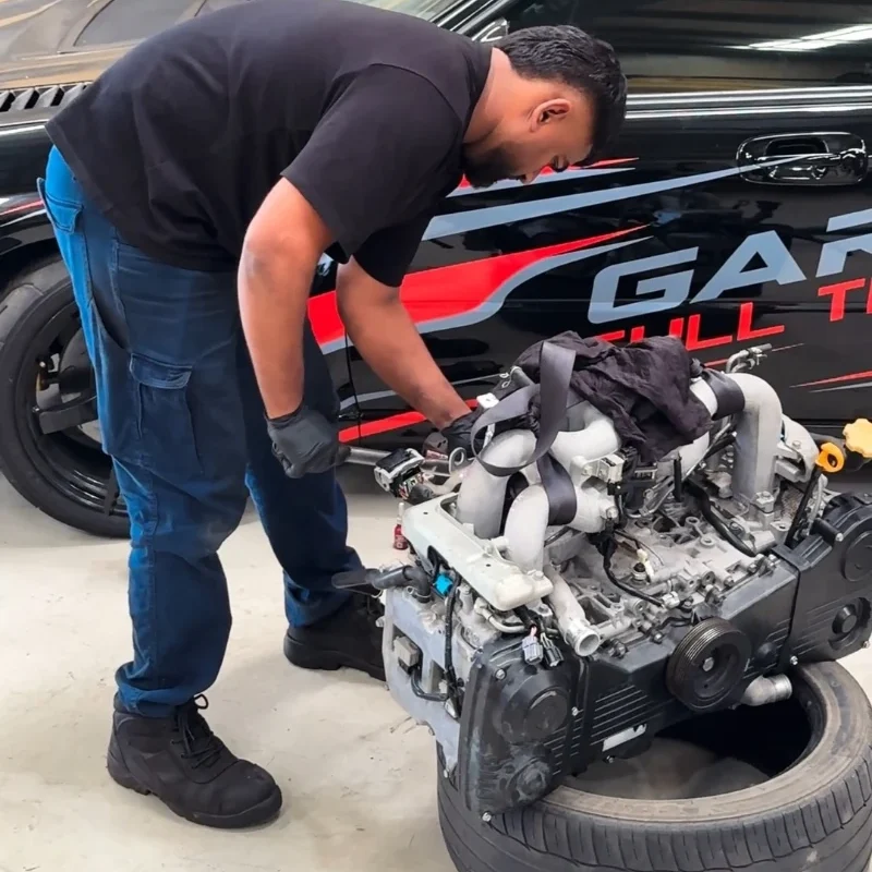 Mechanic inspecting engine components at Garage Full Throttle revealing hidden roadworthy inspection issues in Craigieburn